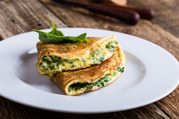 Baby spinach and parmesan cheese omelette, healthy vegetarian breakfast