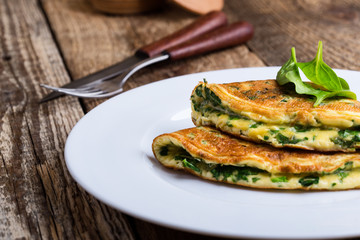 Baby spinach and parmesan cheese omelette, healthy vegetarian breakfast