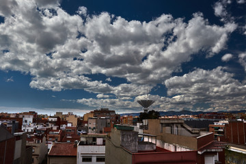 Fototapeta premium City and sky with clouds