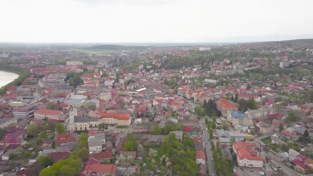 Drone Aerial Panorama of Uzhhorod Ukraine With River Which Divides City on Two Part Redidental Area and Buildings on Spring Day