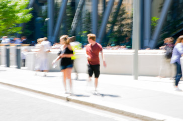 Blur of business people walking in the City of London. UK