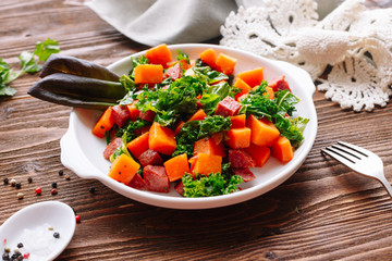 Fresh salad with  raw tuna and carrot. Diet. 
