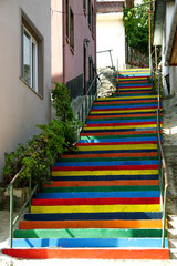 Fototapeta na wymiar Colorfully painted stairs in Tirilye Bursa Turkey