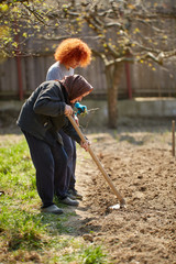 Mother and daughter gardening