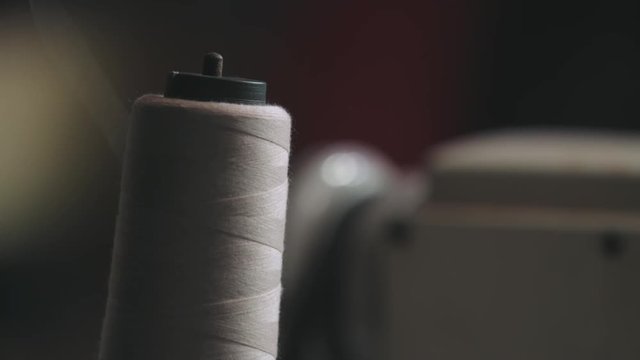 Static Shot Of Spool Thread On A Sewing Machine