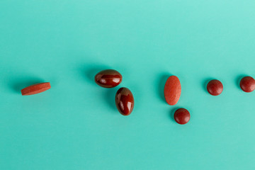 Different brown medicinal tablets and capsules