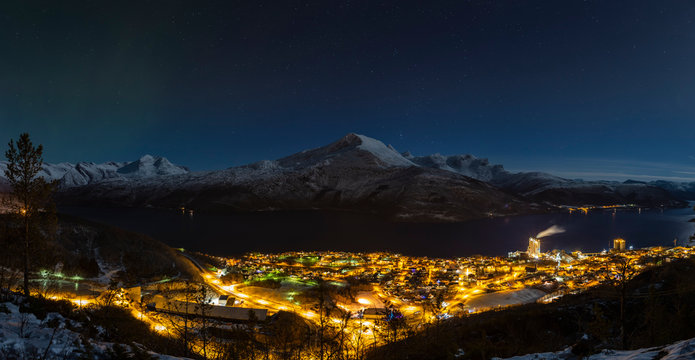 Fullmoon night over small city in Norway