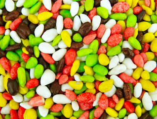 Sunflower seeds in caramel glaze. Texture. Background.