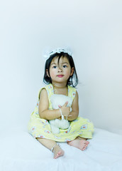Obraz na płótnie Canvas Portrait of cute asian little girl