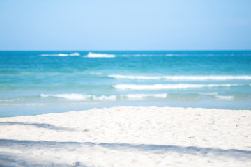 Landscape image of tropical white beach with blue sky background