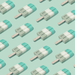 Colorful Ice cream popsicle pattern on pastel blue background. Minimal summer concept. Flat lay.