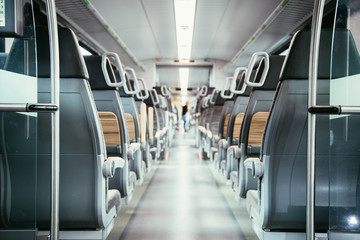 Obraz premium Interior of a public transport train, empty seats