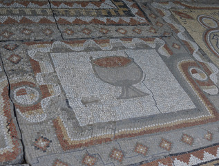 Elements of an ancient ceramic mosaic on the stone