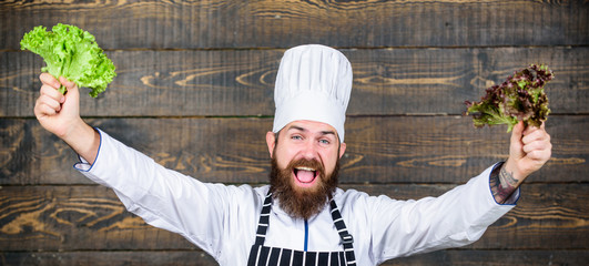 Living a healthy life. Dieting organic food. Healthy food cooking. Mature hipster with beard. Cuisine culinary. Vitamin. Vegetarian salad with fresh vegetables. Happy bearded man. chef recipe