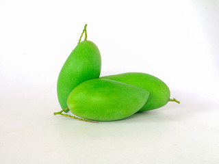 Green mango in a white background.