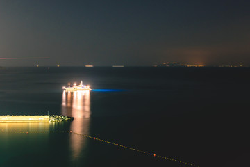 Night scene of Sorrento, the pier with lots of yachts, a corner of the cityscape on a summer night,...