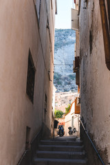 Fototapeta na wymiar small Italian street, vertical photo
