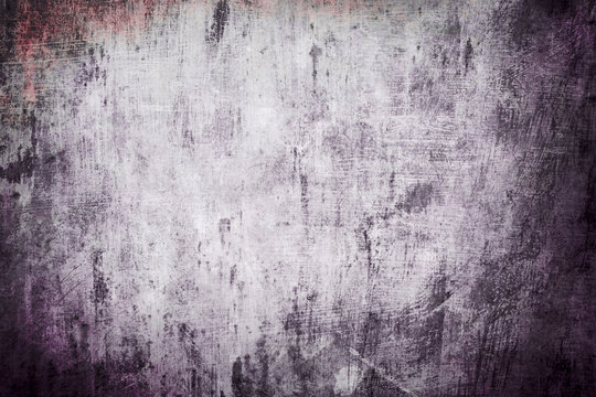 Old purple grungy wall background or texture