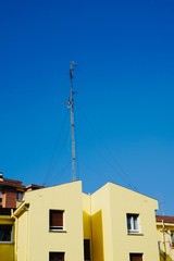 television aerial on the building rooftop in the city. Bilbao, Spain,
