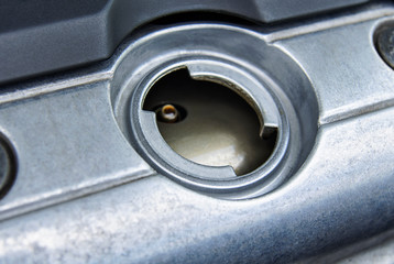 Hole for motor oil fill on top of the engine