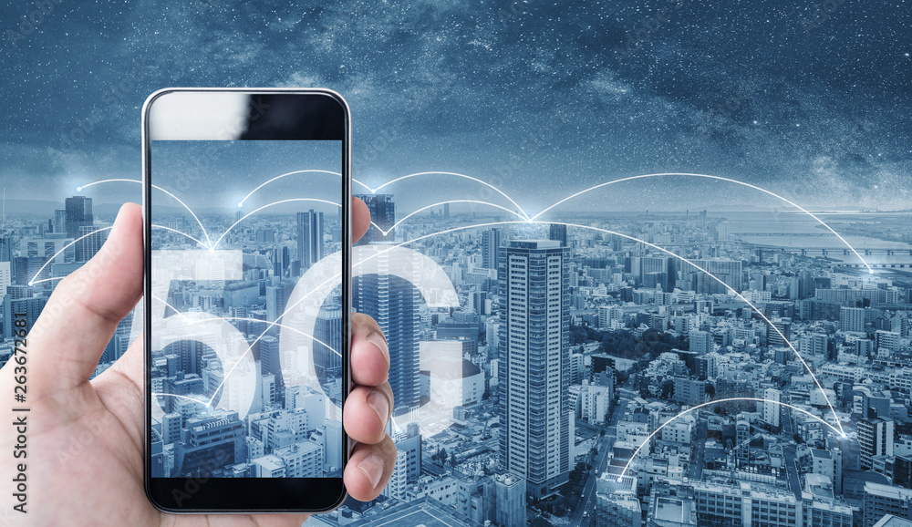 Aufkleber hand using mobile smart phone, and wireless network connection technology in the city, with 5g inter