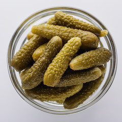 pickled vegetables on a white acrylic background