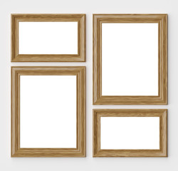 Wood frames for picture or photo on white wall with shadows with