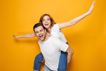 Portrait of a cheerful young couple standing