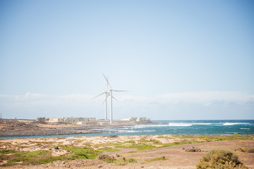 wind turbins renewable energy from ocean sea environmental concept