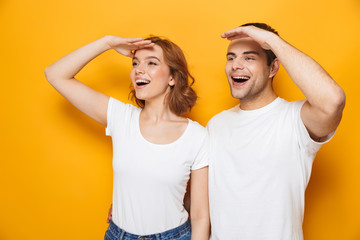 Portrait of a cheerful young couple standing