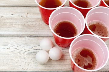 Cups for game Beer Pong on the table