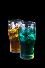 Two summer cocktail on isolated black background