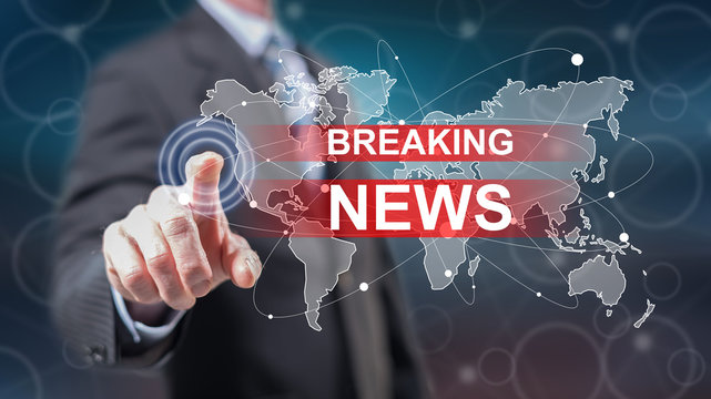 Man touching a breaking news concept