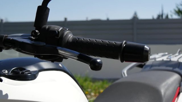 close-up of the gas grip of the motorcycle