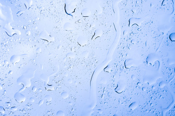 Picture Inside of water rain drops on car window glass