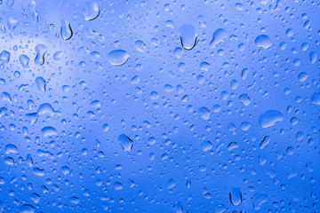 Picture Inside of water rain drops on car window glass