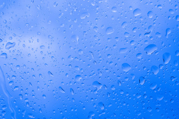 Picture Inside of water rain drops on car window glass