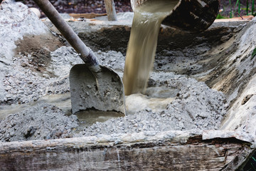Knead concrete by hand