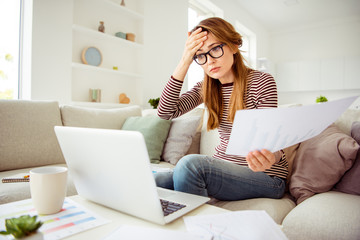 Close up photo beautiful she her model lady arms hold paper contract spilled tea spoiled official document worried wear jeans denim striped pullover clothes sit comfort divan house living room indoors