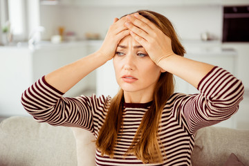 Close up photo beautiful she her lady arms hold head look side terrible suffer pain displeased...