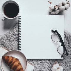 Flat lay of workplace and breakfast