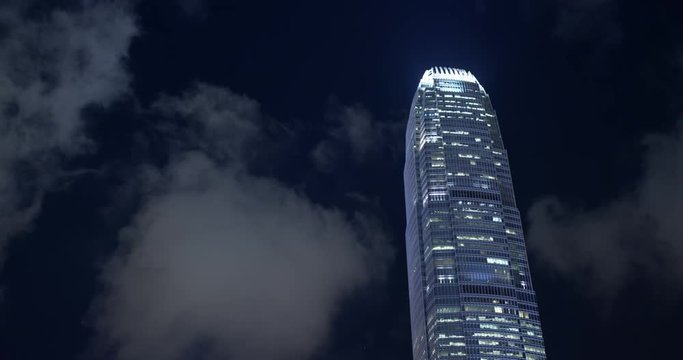 Business tower with cloud at night