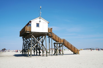 beach stilt house or building on stilts at German seaside resort St. Peter-Ording or SPO