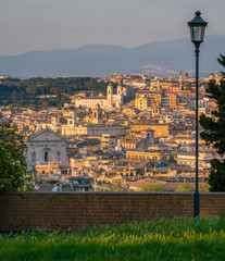 Late afternoon panorama with Trinità dei Monti from the Gianicolo Terrace in Rome, Italy.