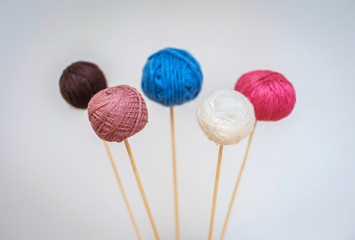 Multicolored balls of wool yarn for knitting