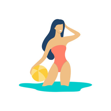 Woman in swimsuit standing with a ball in water