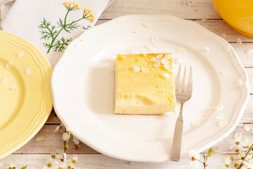 Cheesecake decorated with edible white petals