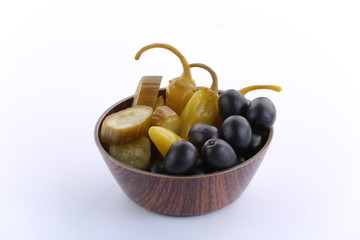 Assorted pickled vegetables in bowl/plate,clipping path.