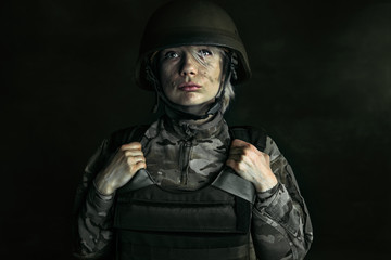 Portrait of young female soldier