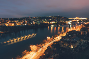 Panorama of the city of Prague, long exposure, the lights of the big city, the view of Bridge on Vltava river